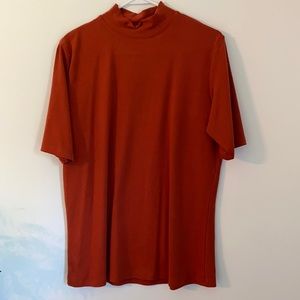 Burnt orange mock-neck top perfect for fall
